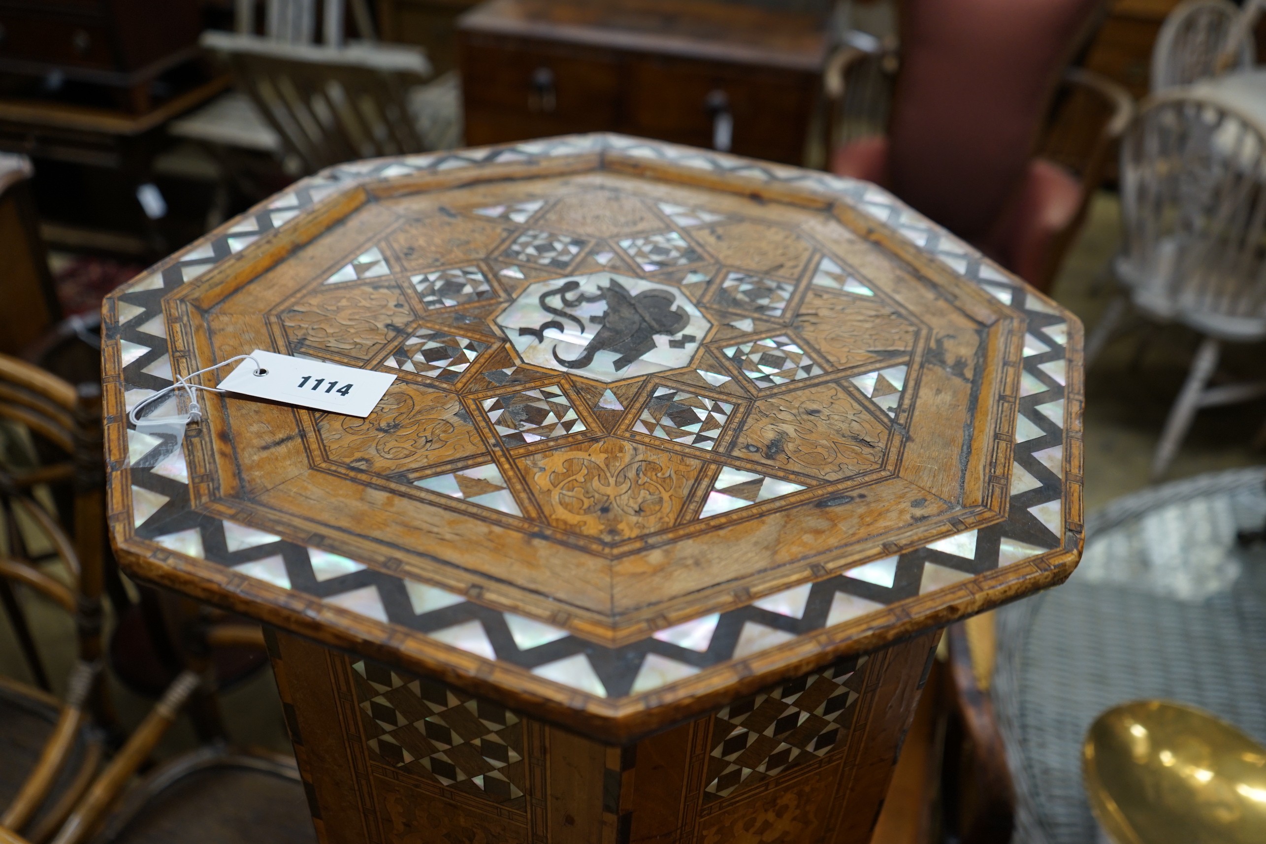 A Moorish octagonal mother of pearl inlaid centre table, width 46cm, height 62cm